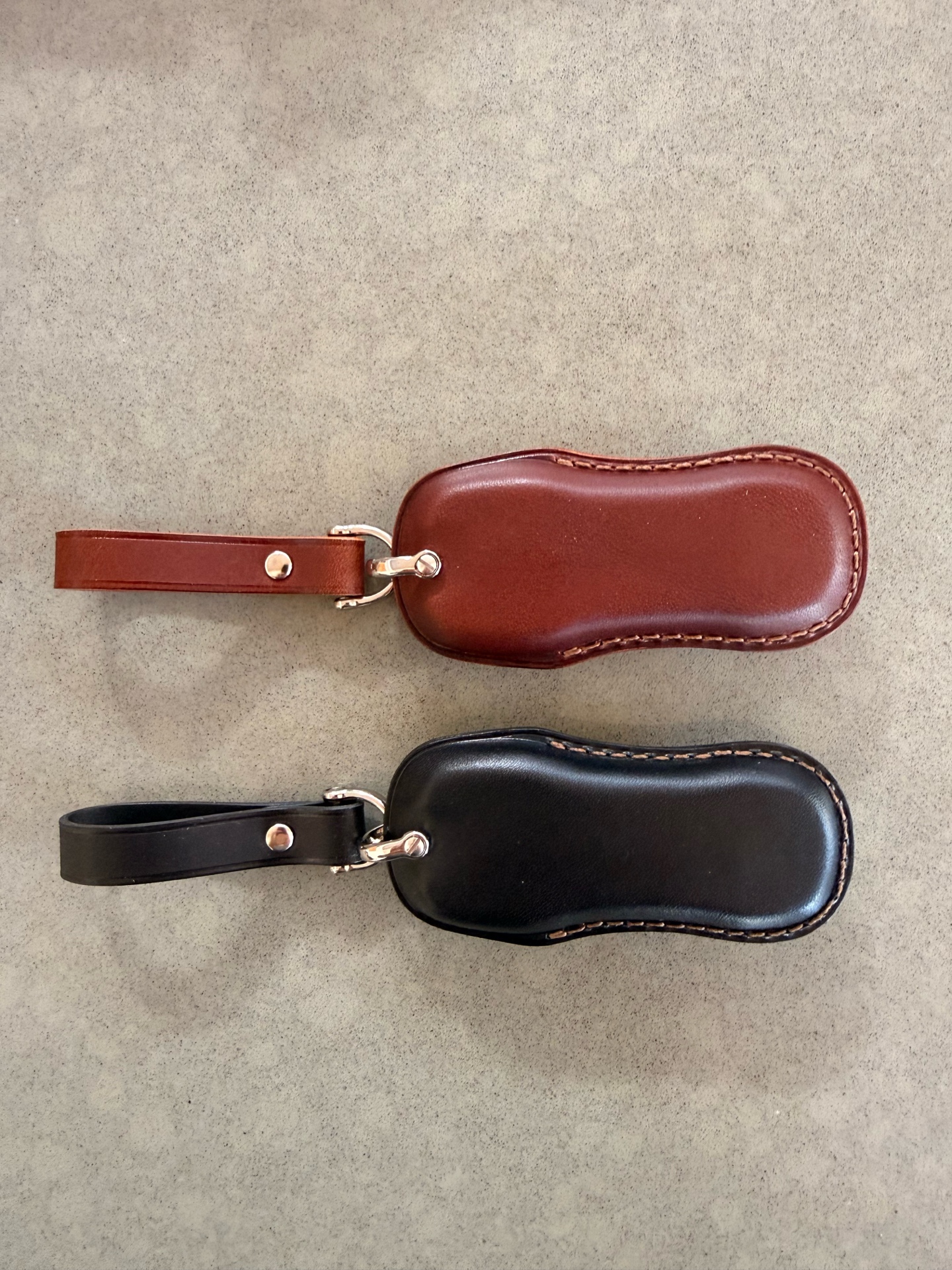 NUNOworkroom key fob covers - dark brown and black, back detail showing smooth leather