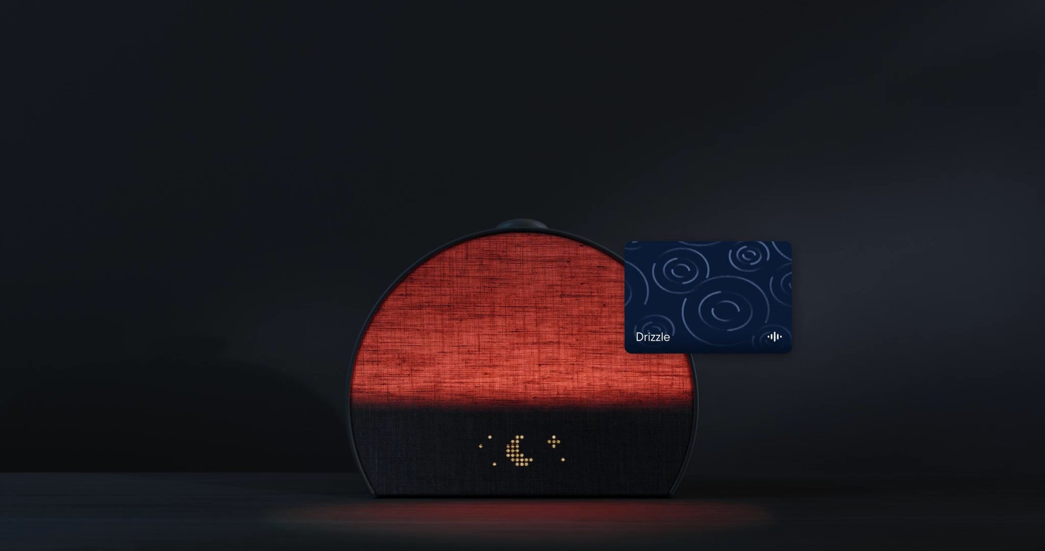 Hatch Restore 3 on a hotel bedside table with candle and flowers